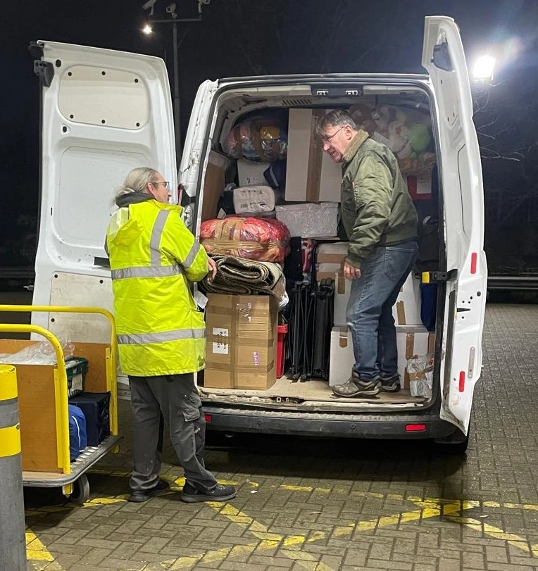 Volunteers packing the van late at night
